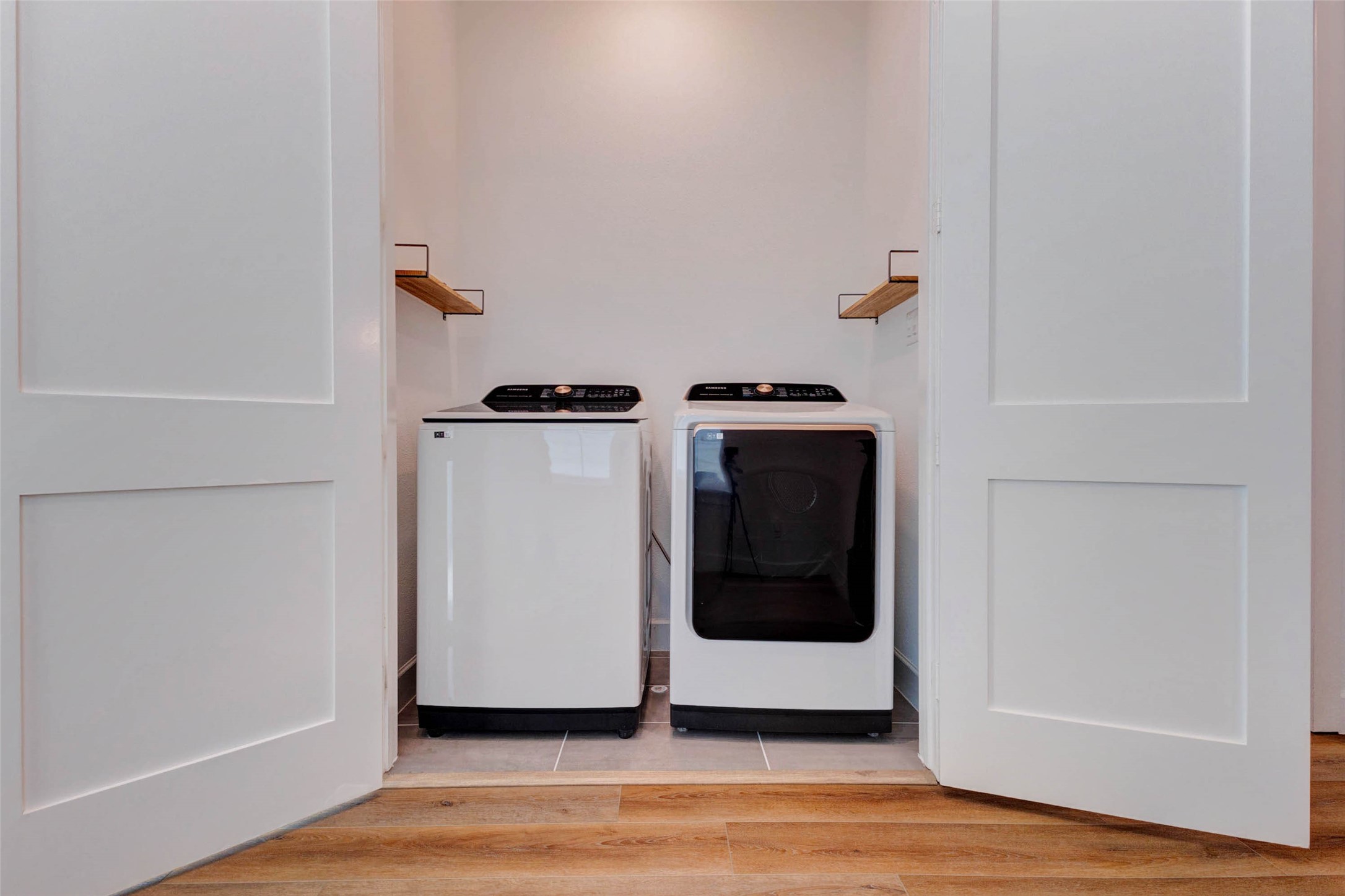 2751 Freund Street Houston, TX 77003 - Photo 30 of 34 a view of an empty room with wooden floor and a window