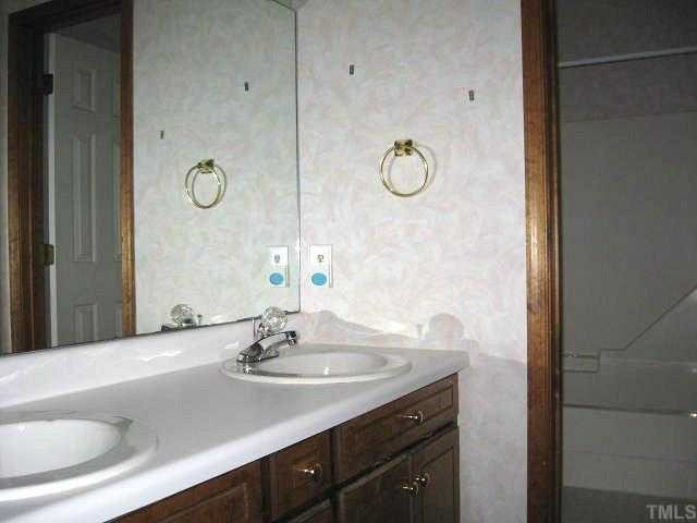124 Plantation Road Clayton, NC 27520 - Photo 6 of 12 Private master bath with dual vanity areas & separate room for tub/shower/toilet Master Bath/Spa