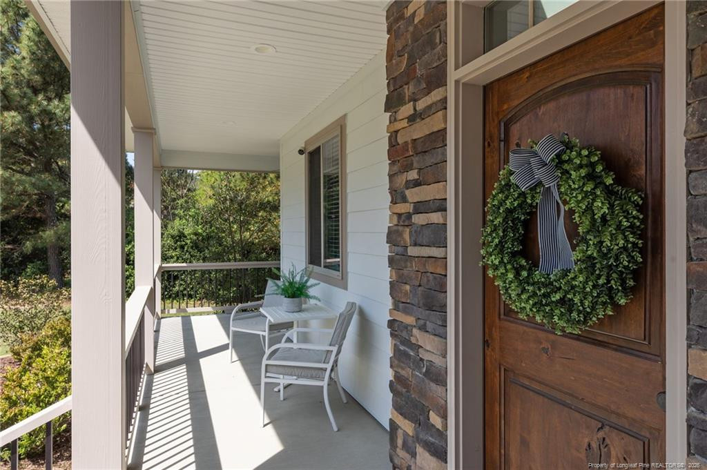 190 Devon Circle Aberdeen, NC 28315 - Photo 3 of 50 a view of balcony with wooden floor and outdoor seating