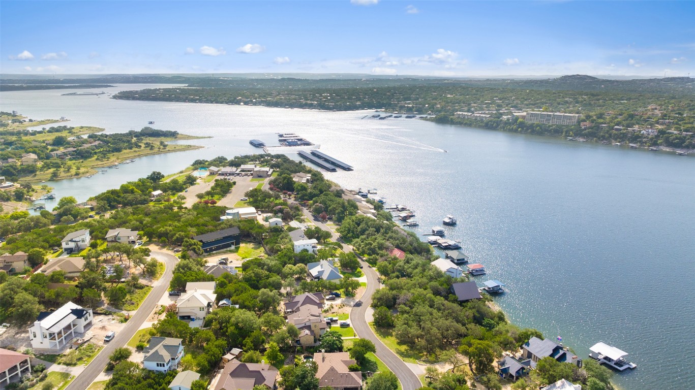 18401 Lakepoint Circle Point Venture, TX 78645 - Photo 20 of 28 a view of a lake with a mountain