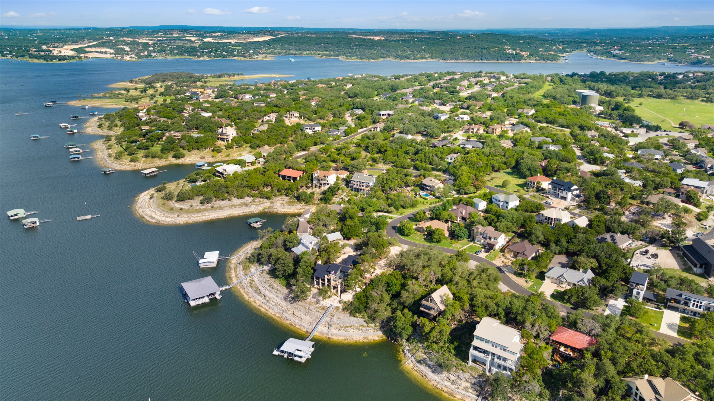 18401 Lakepoint Circle Point Venture, TX 78645 - Photo 25 of 28 a view of a lake with outdoor space