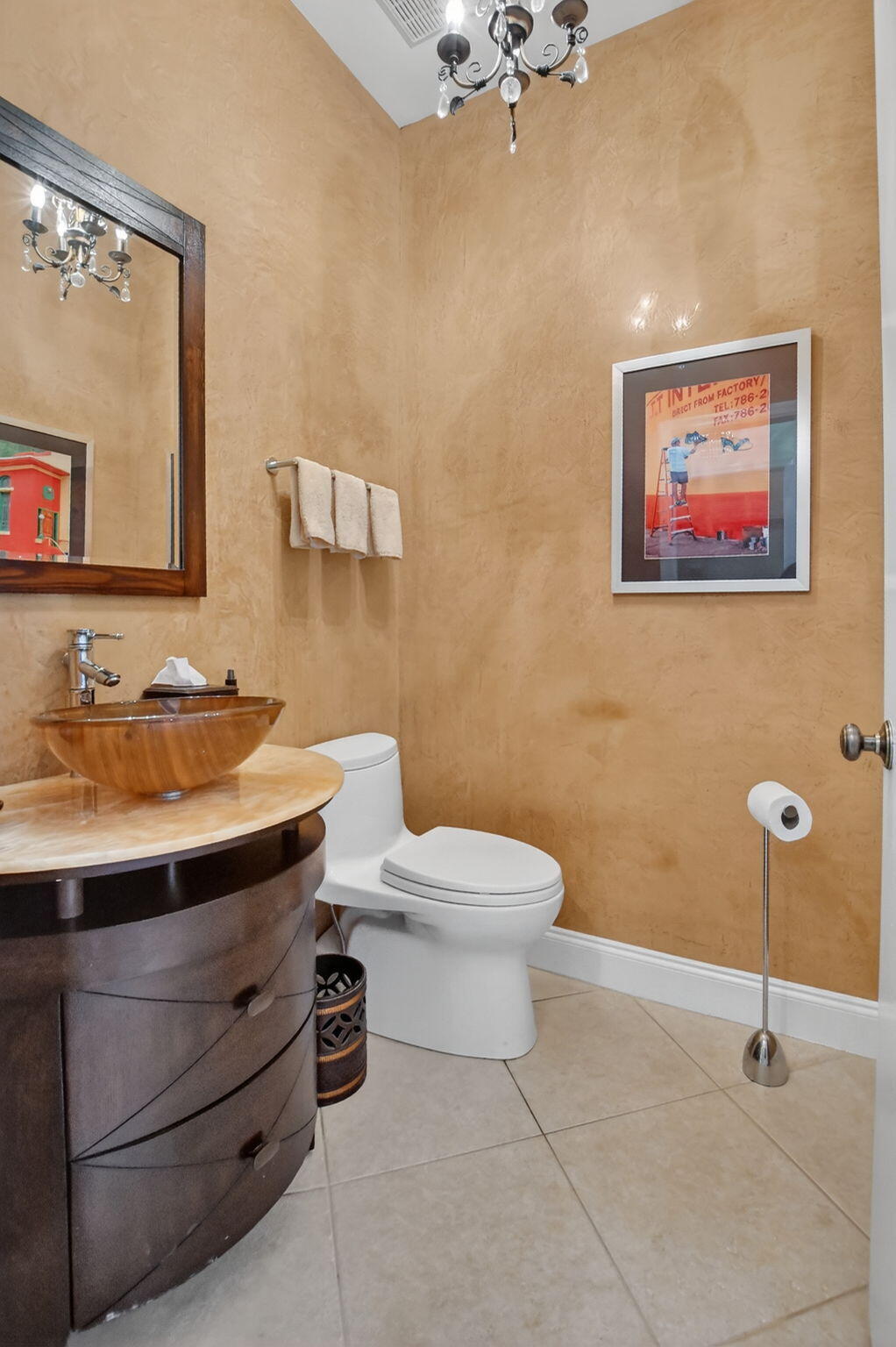 7997 Travelers Tree Drive Boca Raton, FL 33433 - Photo 23 of 54 a bathroom with a toilet a sink and mirror
