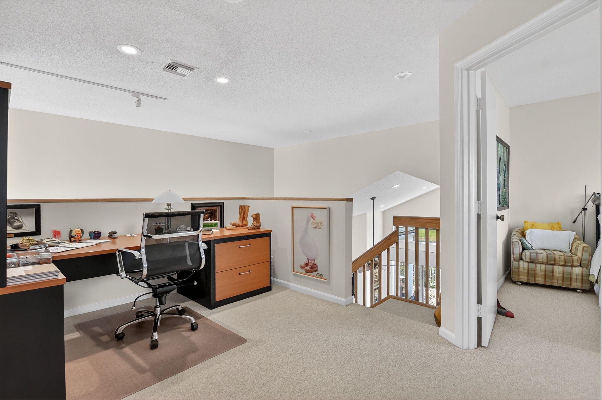 7997 Travelers Tree Drive Boca Raton, FL 33433 - Photo 29 of 54 a view of a workspace with furniture and a livingroom
