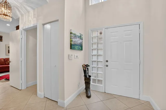 a view of walk in closet with white walls