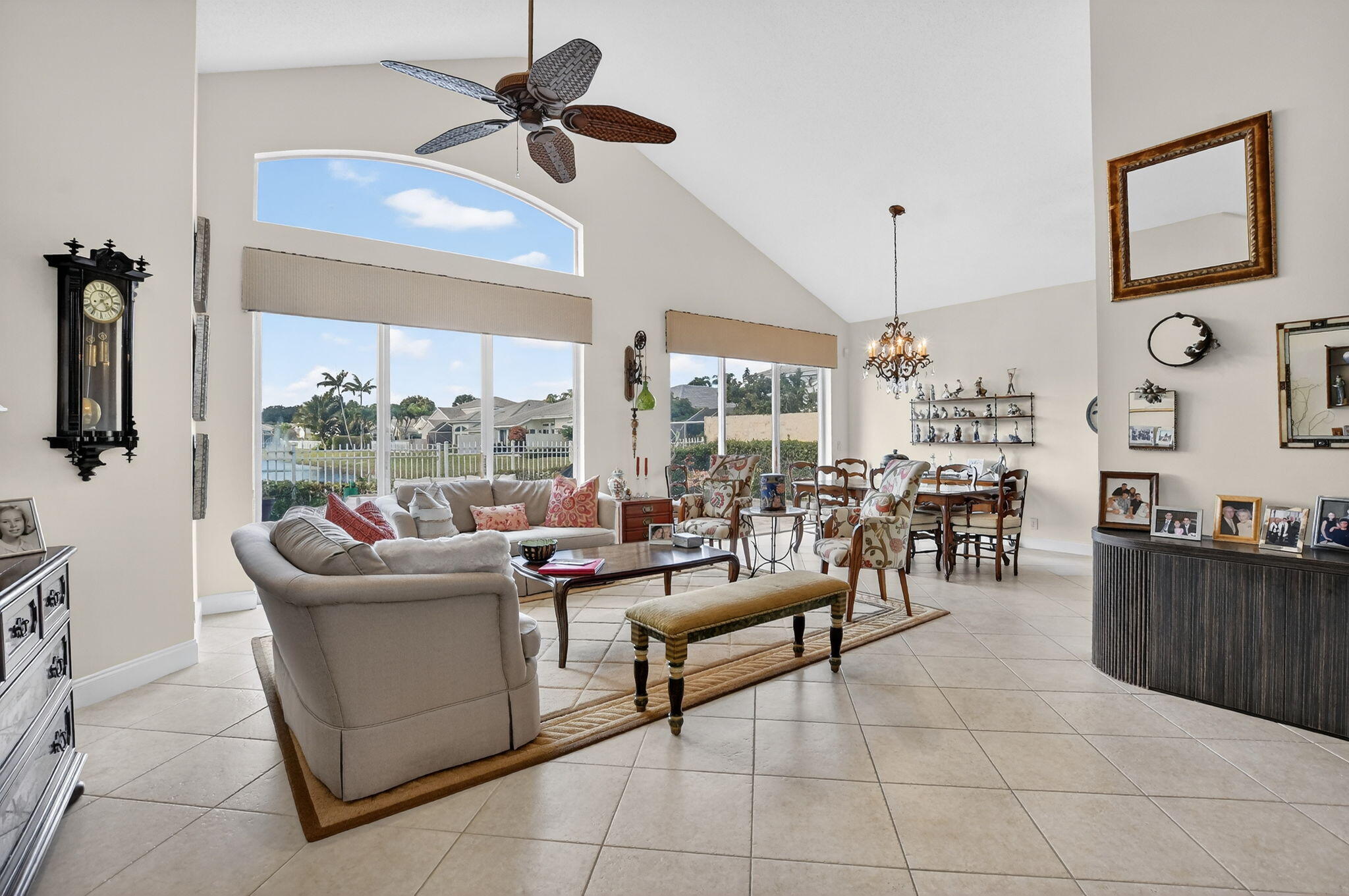 7997 Travelers Tree Drive Boca Raton, FL 33433 - Photo 6 of 54 a living room with furniture and a large window