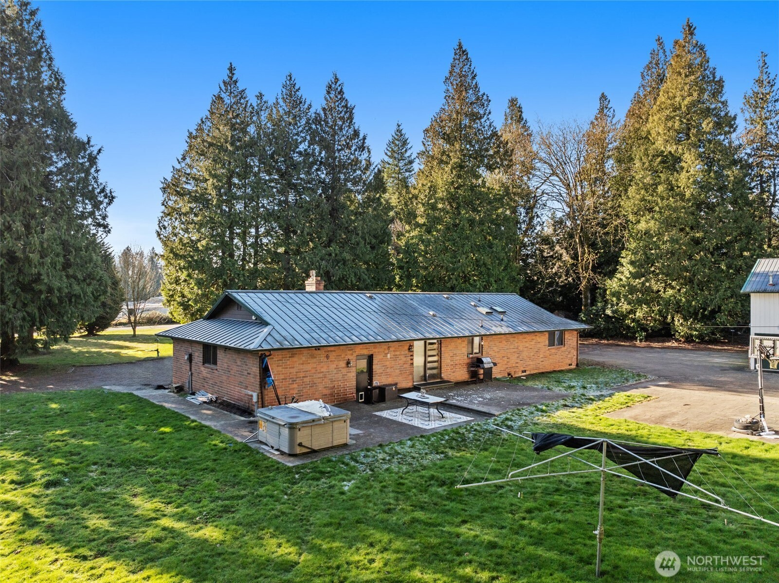 1797 Kaas Road Ferndale, WA 98248 - Photo 12 of 17 an aerial view of a house with swimming pool and yard