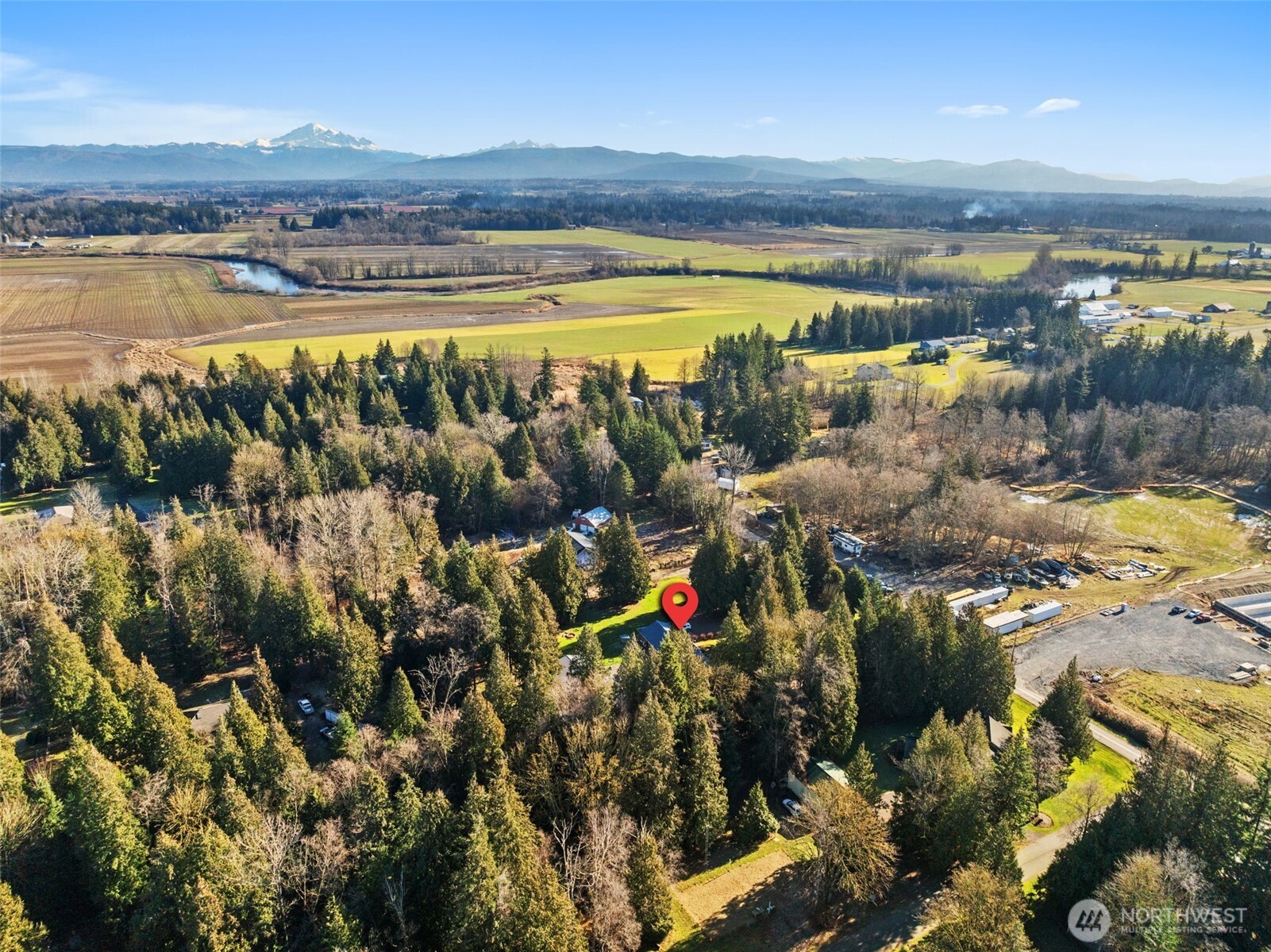 1797 Kaas Road Ferndale, WA 98248 - Photo 16 of 17 a view of a lake with a mountain in the background