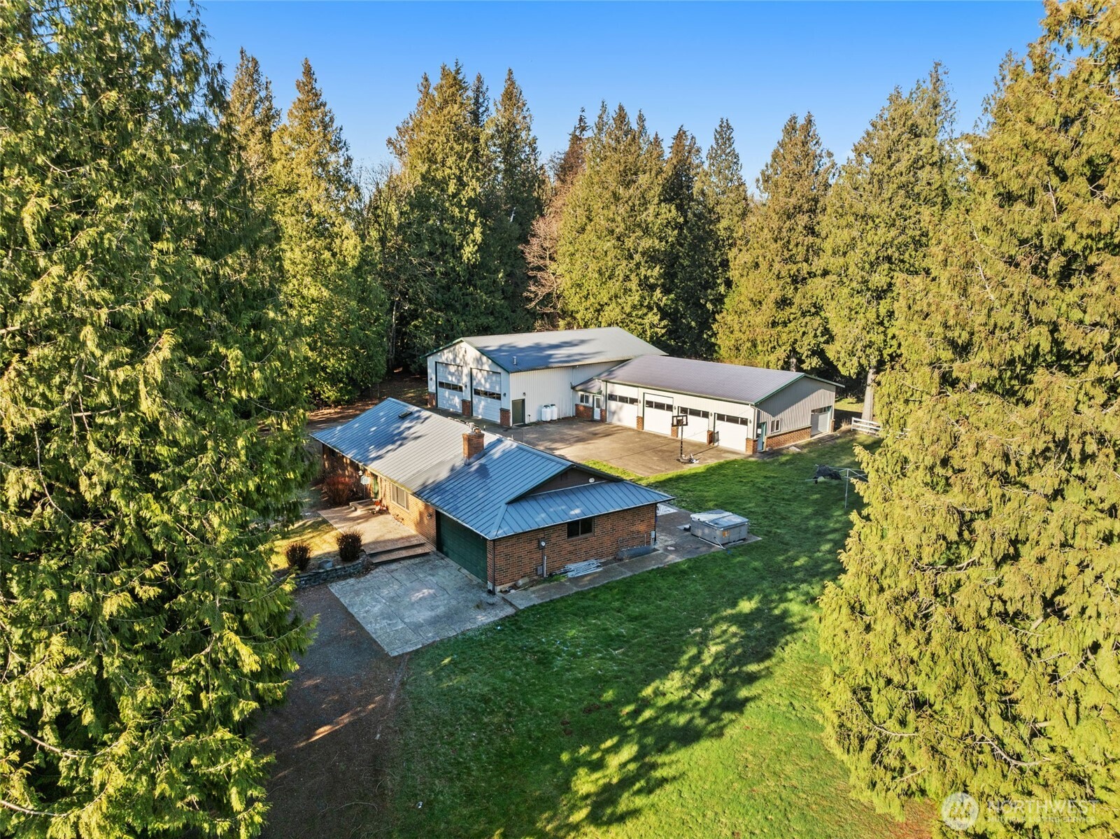 1797 Kaas Road Ferndale, WA 98248 - Photo 2 of 17 a view of a chairs in a backyard