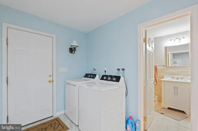 a utility room with dryer and washer