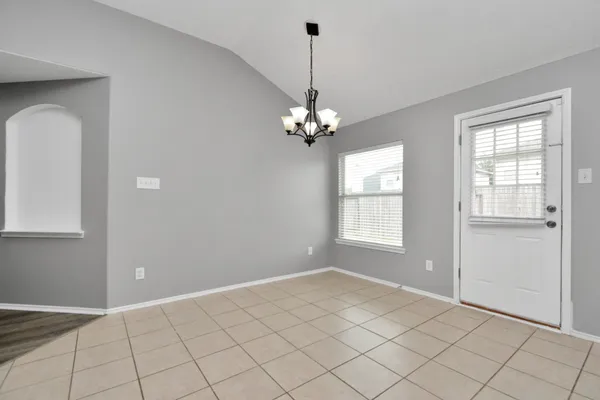 a view of an empty room with window