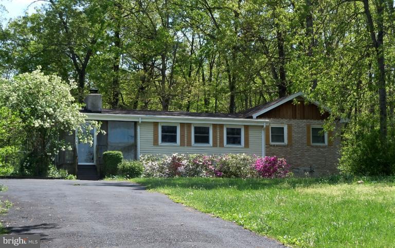 6494 Howellsville Road Front Royal, VA 22630 - Photo 1 of 1 a front view of house with yard and green space