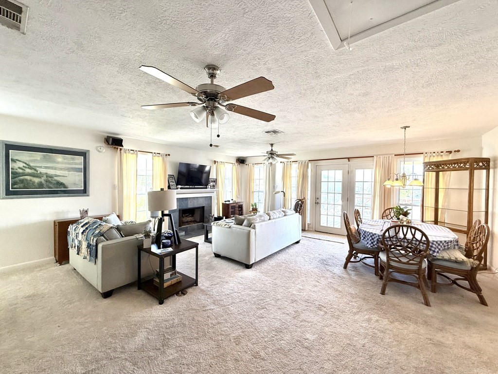 30 Flamingo Road Rockport, TX 78382 - Photo 15 of 39 a living room with furniture and a large window