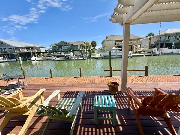 a view of a lake from a balcony