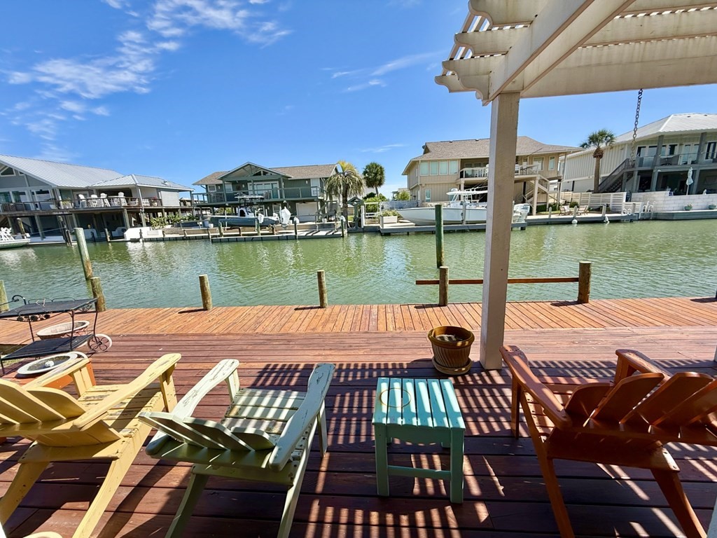 30 Flamingo Road Rockport, TX 78382 - Photo 2 of 39 a view of a lake from a balcony