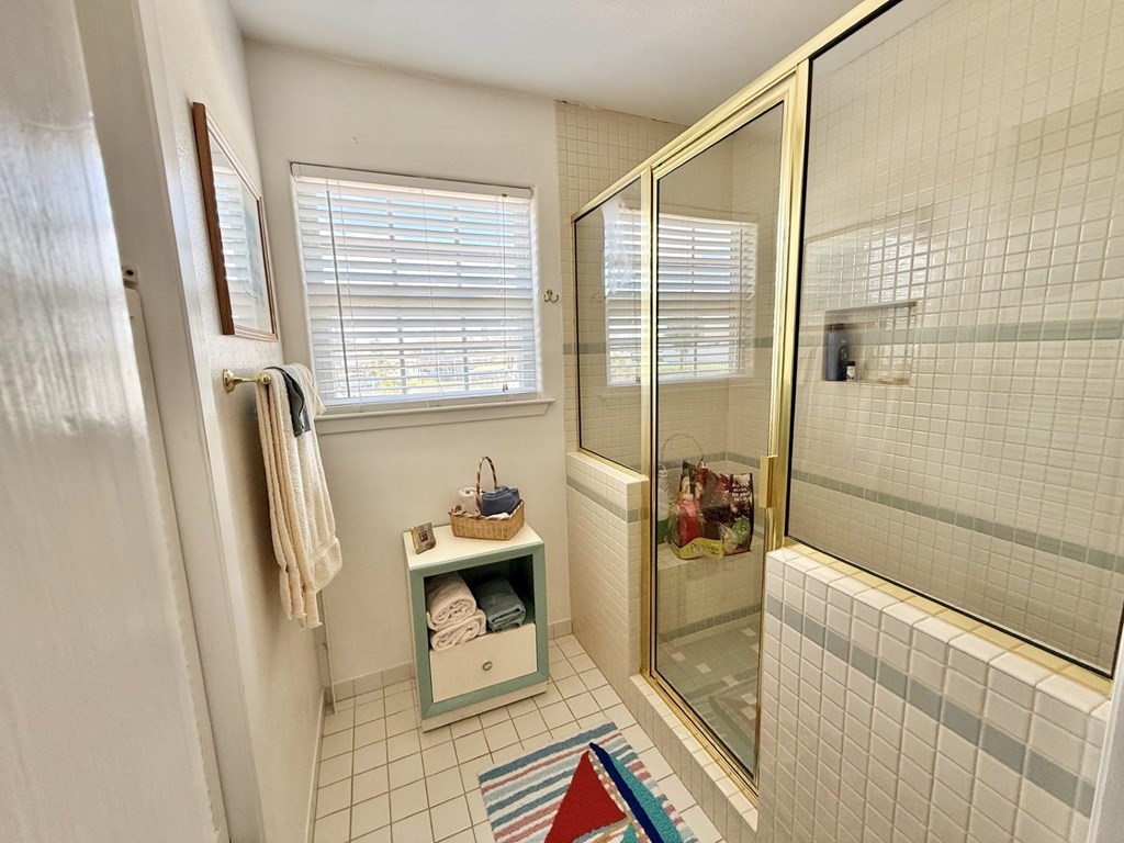 30 Flamingo Road Rockport, TX 78382 - Photo 25 of 39 a bath room with a sink a bath tub and a shower