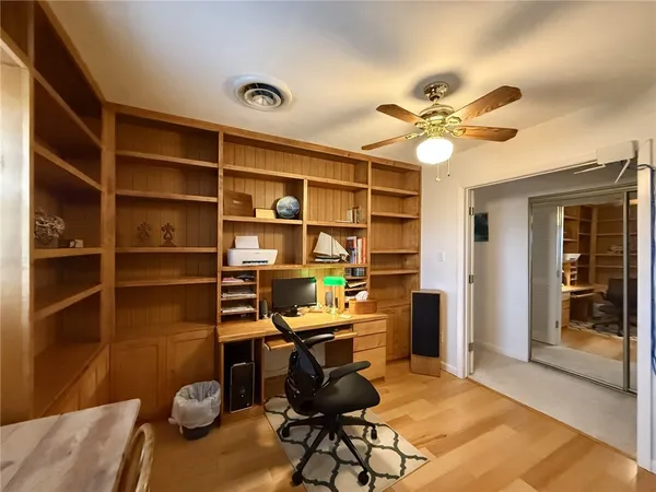 a view of a workspace with furniture