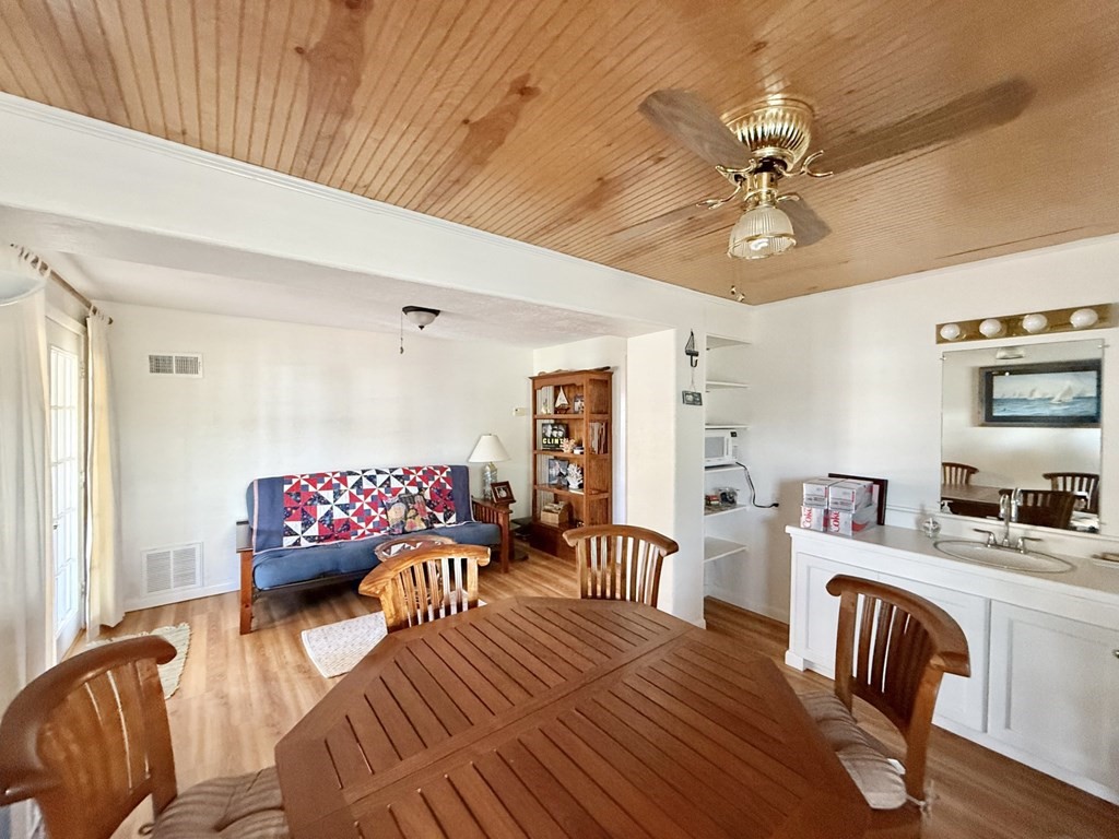30 Flamingo Road Rockport, TX 78382 - Photo 30 of 39 a living room with furniture and wooden floor