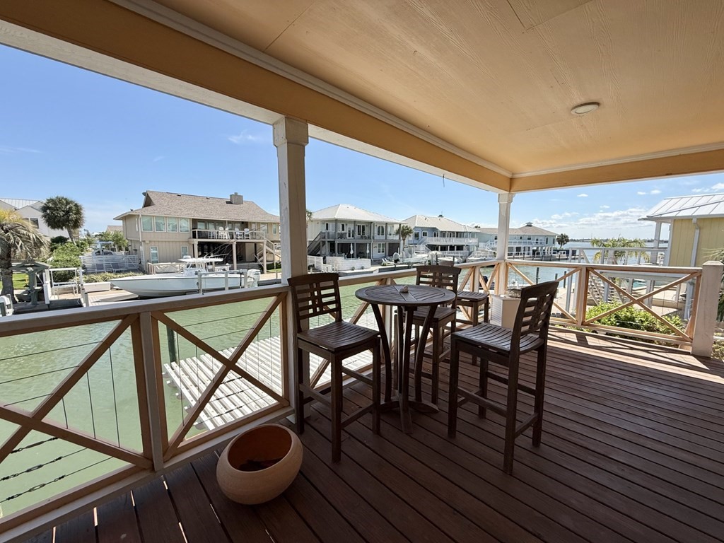 30 Flamingo Road Rockport, TX 78382 - Photo 6 of 39 a view of a terrace with furniture and stove