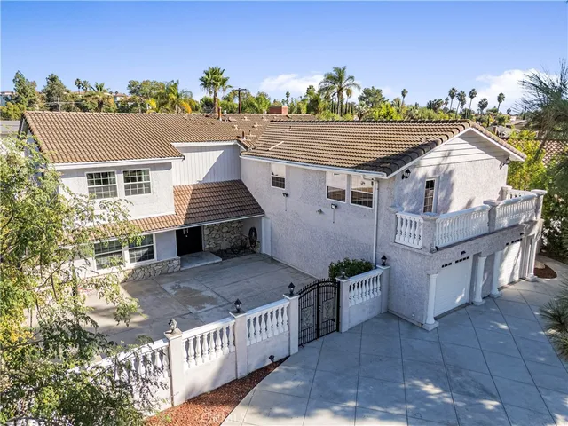 a view of a house with a roof deck