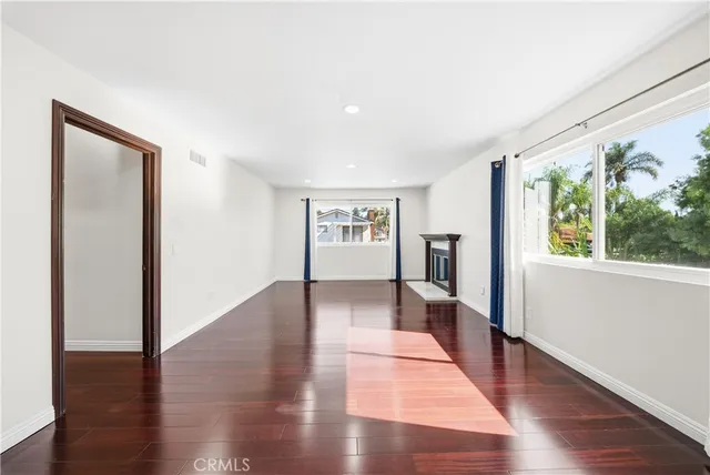a view of a swimming pool with lounge chairs
