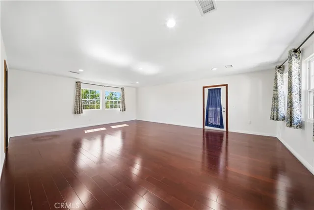 a view of a backyard with sitting area