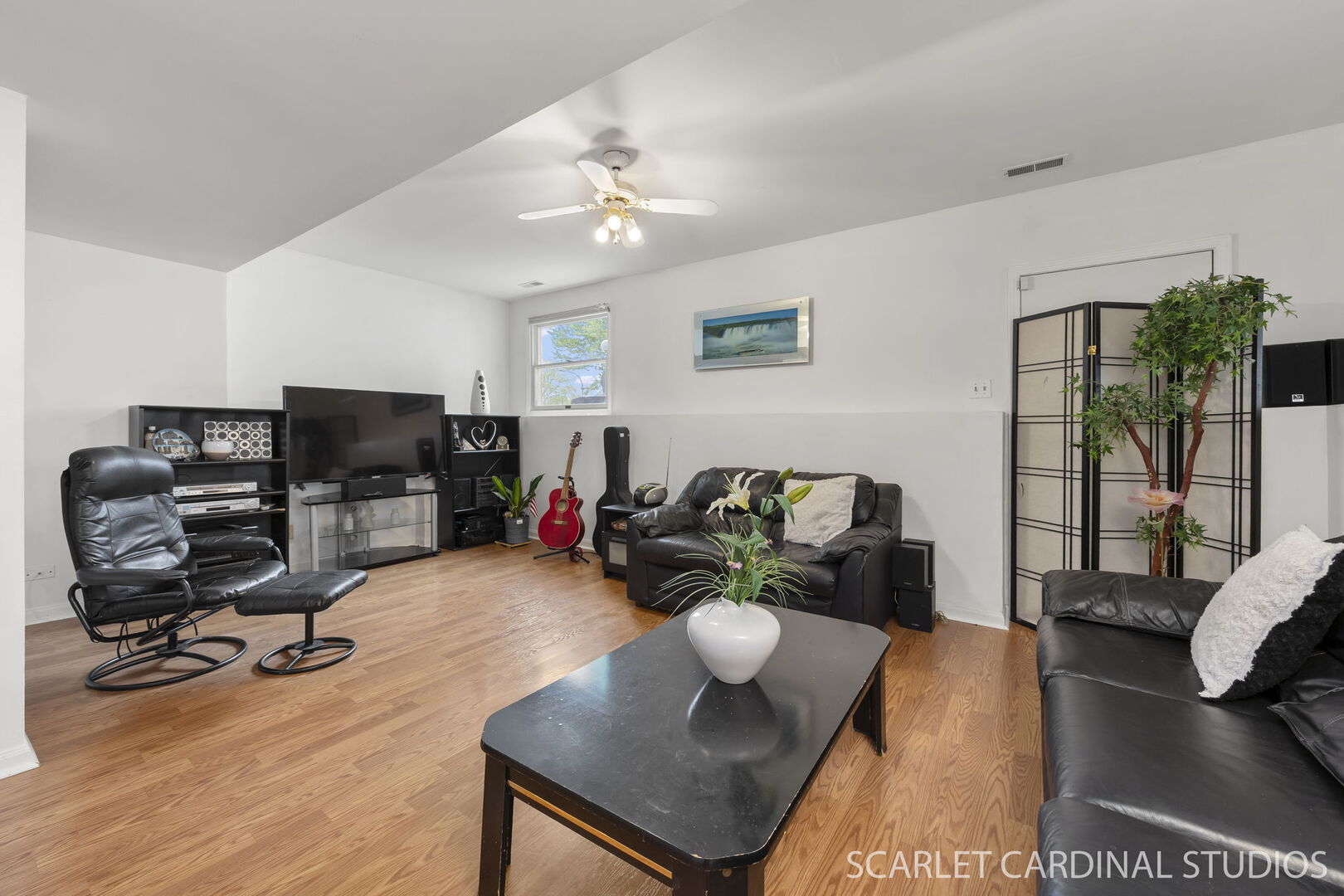 1004 Prairie View Court Naperville, IL 60563 - Photo 19 of 33 a living room with furniture and a flat screen tv