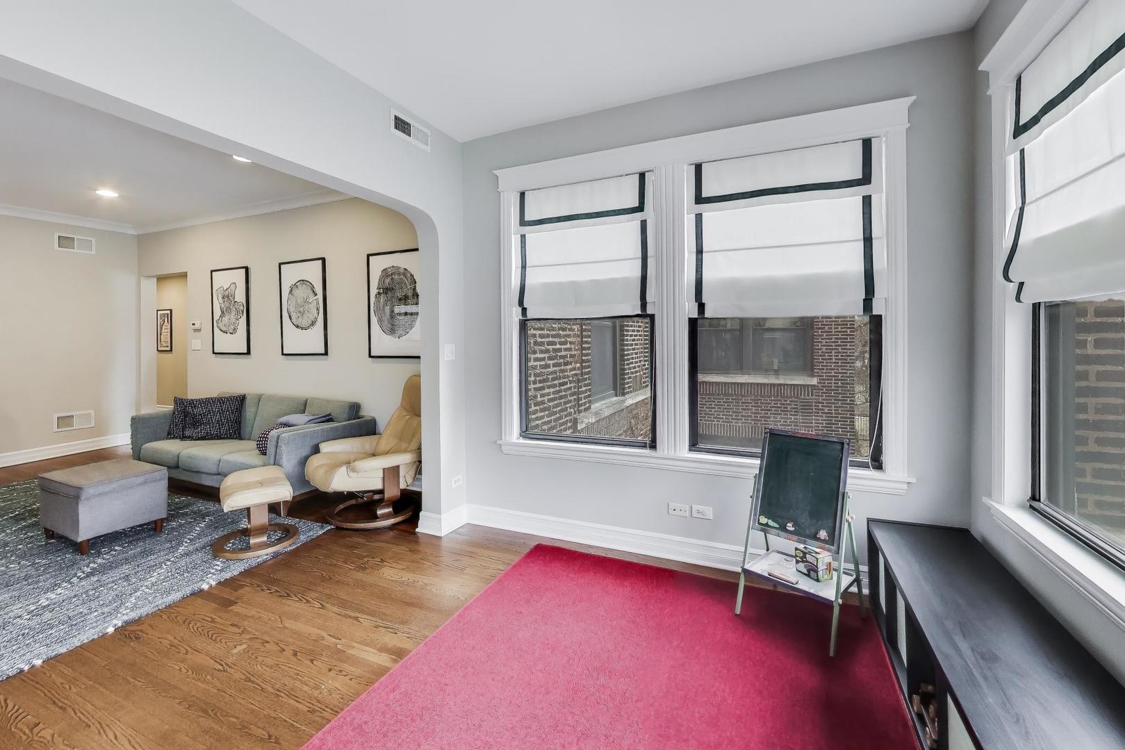 4441 North Beacon Street, Unit 2A Chicago, IL 60640 - Photo 6 of 23 a bedroom with furniture and a window