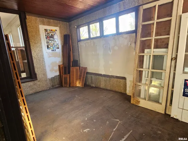 a white bath tub sitting in a bathroom