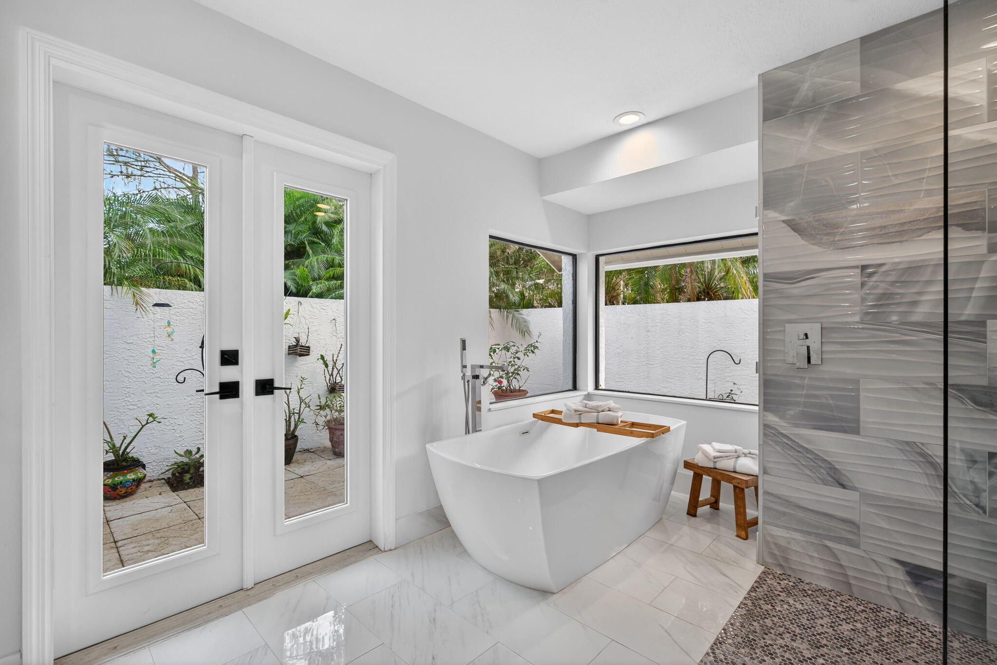 1488 Southeast Colony Way Jupiter, FL 33478 - Photo 26 of 46 Primary Bathroom with Private Terrace