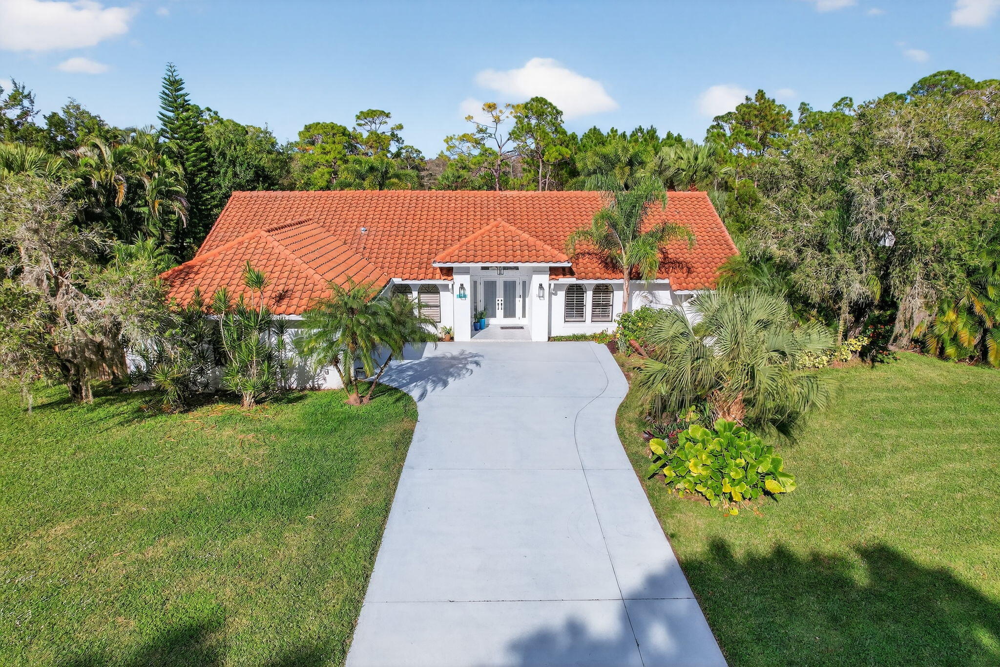 1488 Southeast Colony Way Jupiter, FL 33478 - Photo 8 of 46 Front of Home-Aerial Street View
