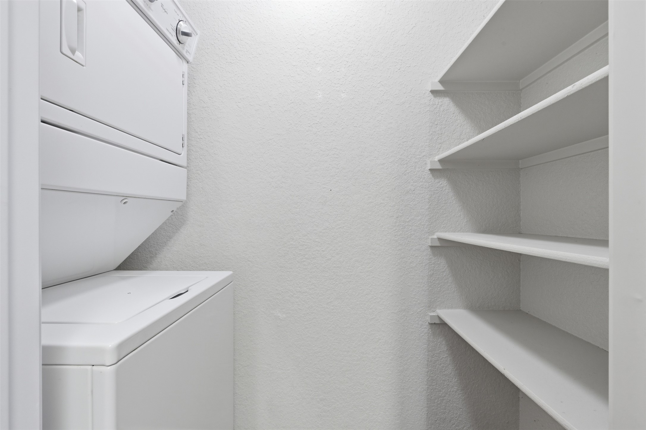 4529 Secure Lane, Unit 31 Austin, TX 78725 - Photo 12 of 38 a utility room with dryer and washer