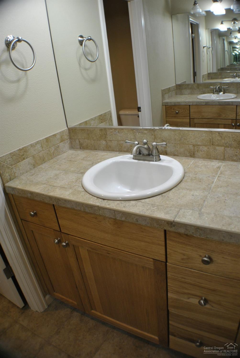 20249 Schaeffer Drive Bend, OR 97703 - Photo 7 of 11 Master Bathroom with double vanity and s