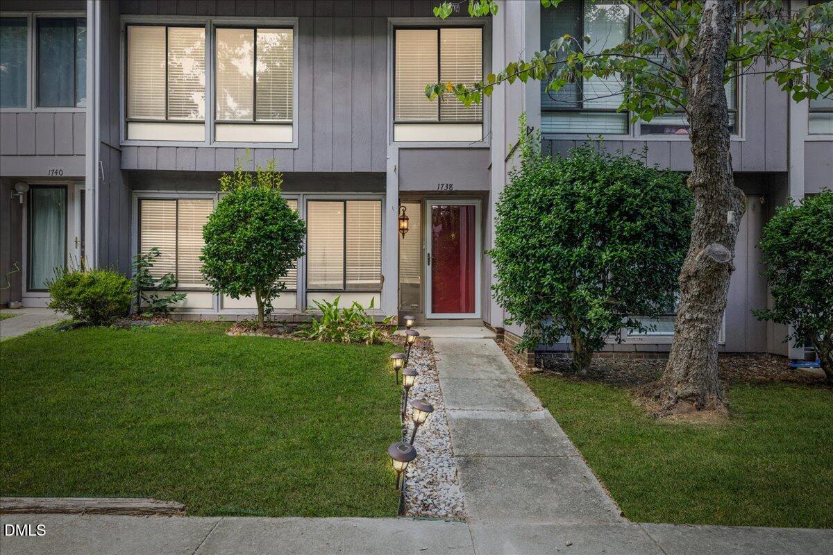 1738 Quail Ridge Road Raleigh, NC 27609 - Photo 1 of 38 front view of house with a yard