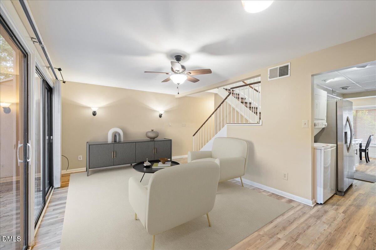 1738 Quail Ridge Road Raleigh, NC 27609 - Photo 16 of 38 a living room with furniture and a ceiling fan