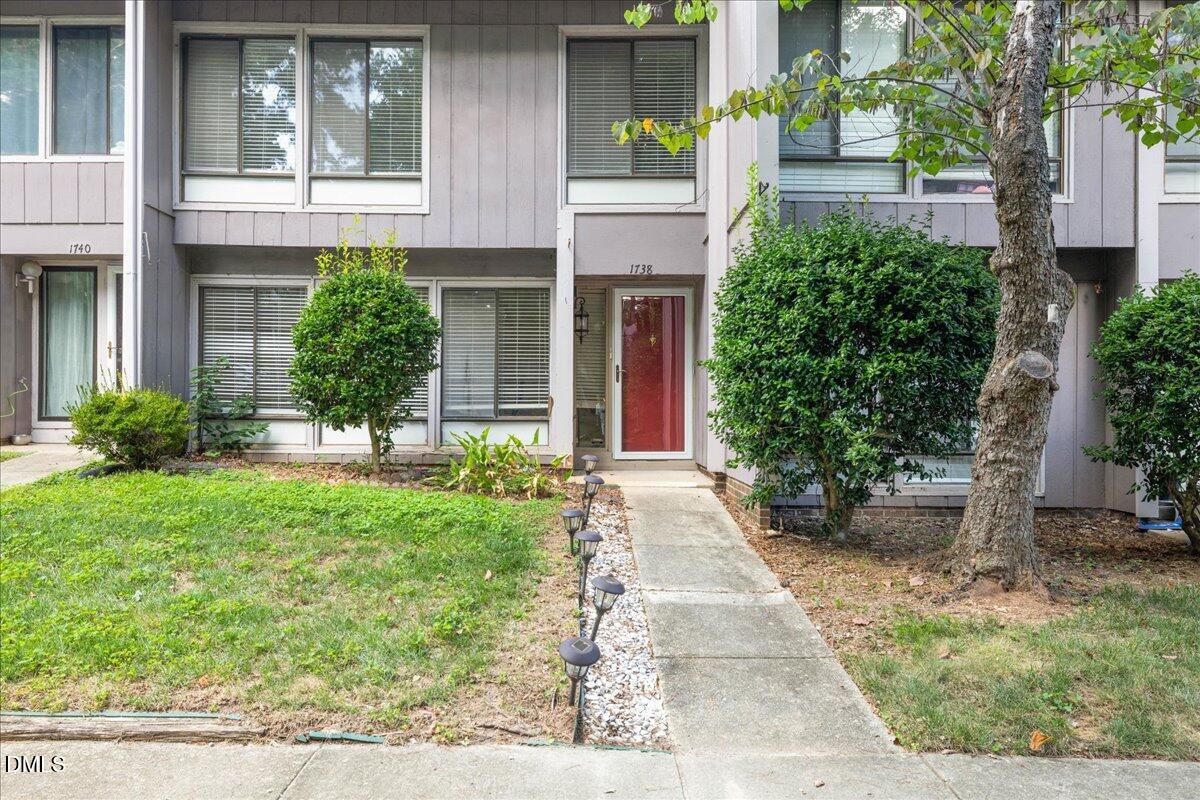 1738 Quail Ridge Road Raleigh, NC 27609 - Photo 2 of 38 front view of house with potted plants