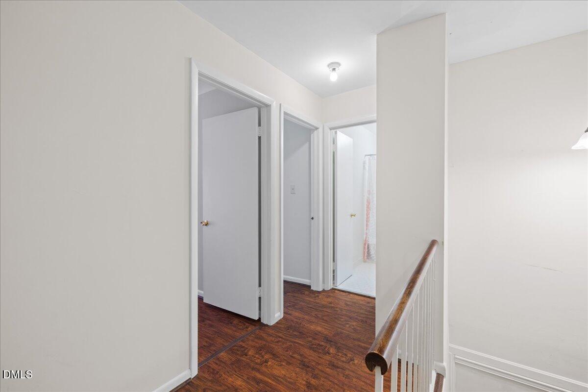 1738 Quail Ridge Road Raleigh, NC 27609 - Photo 29 of 38 a view of hallway with wooden floor