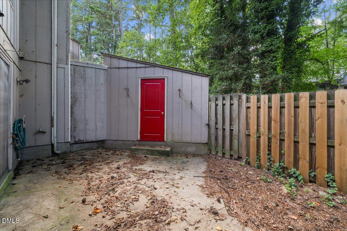 1738 Quail Ridge Road Raleigh, NC 27609 - Photo 35 of 38 a view of a barn with wooden fence
