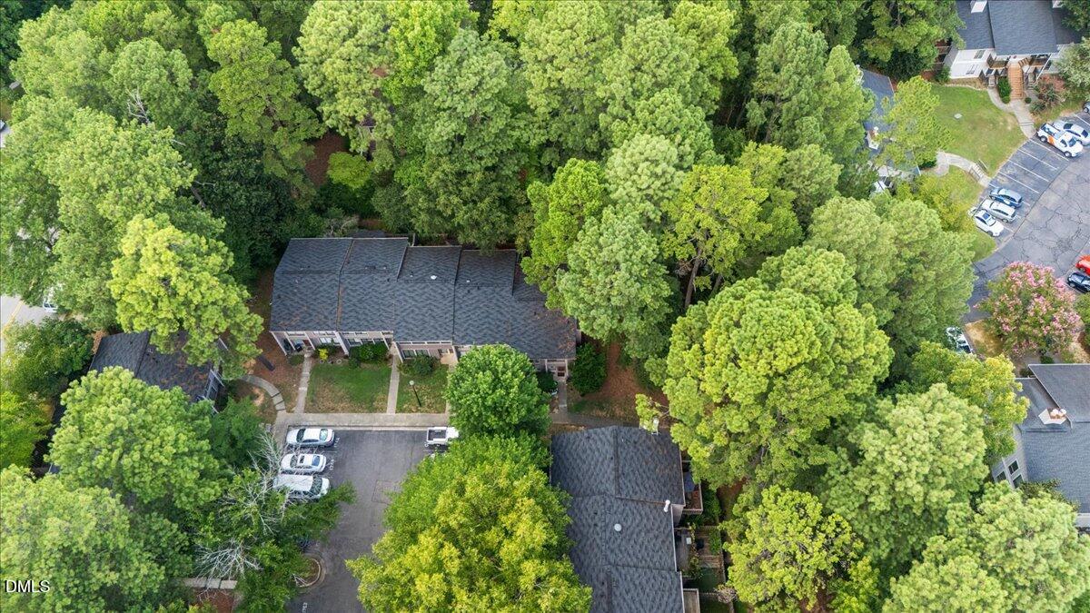 1738 Quail Ridge Road Raleigh, NC 27609 - Photo 38 of 38 an aerial view of a house with a yard and large trees