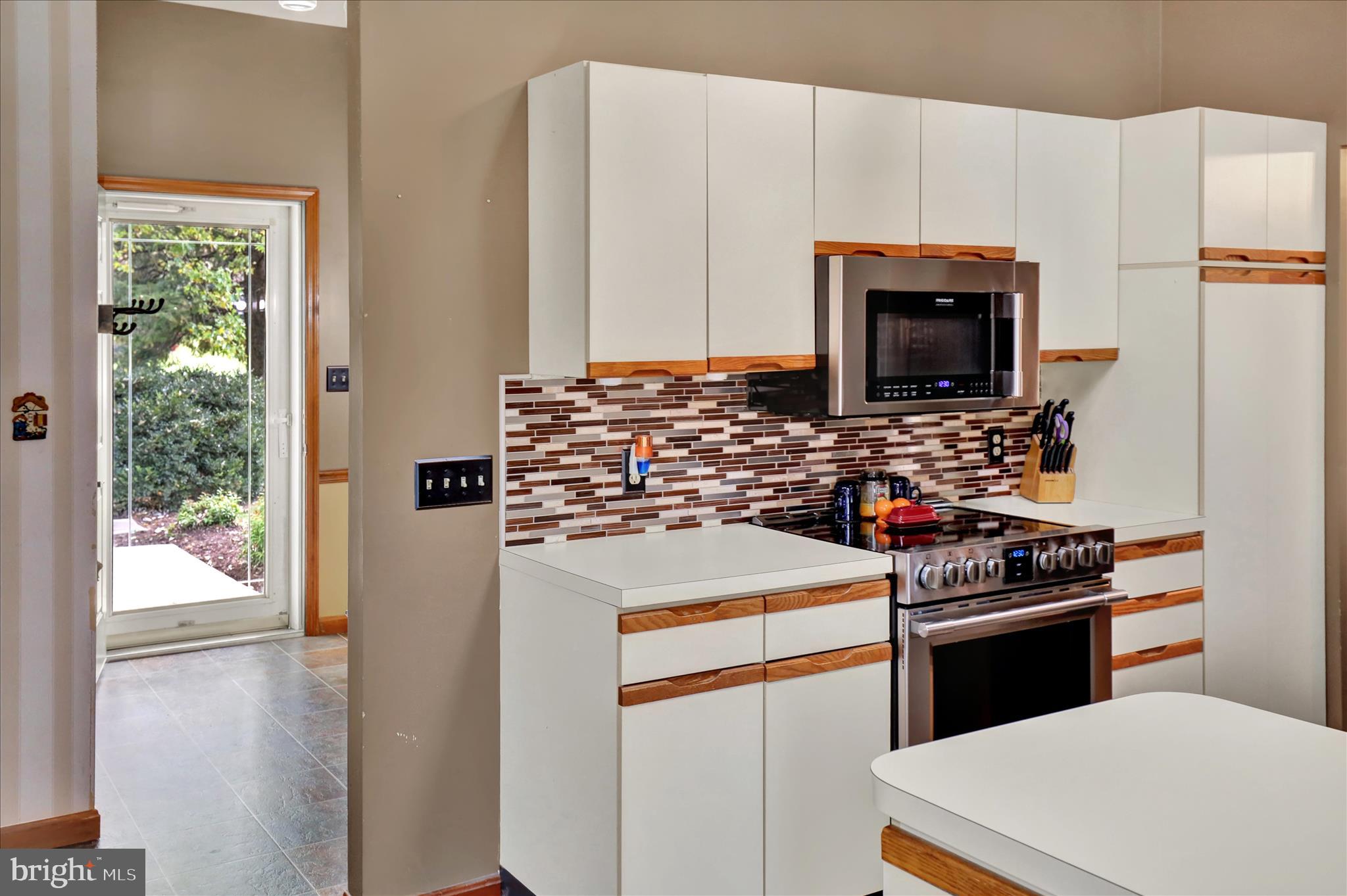 280 Snavely Mill Road Lititz, PA 17543 - Photo 13 of 45 a kitchen with a stove a sink and a refrigerator