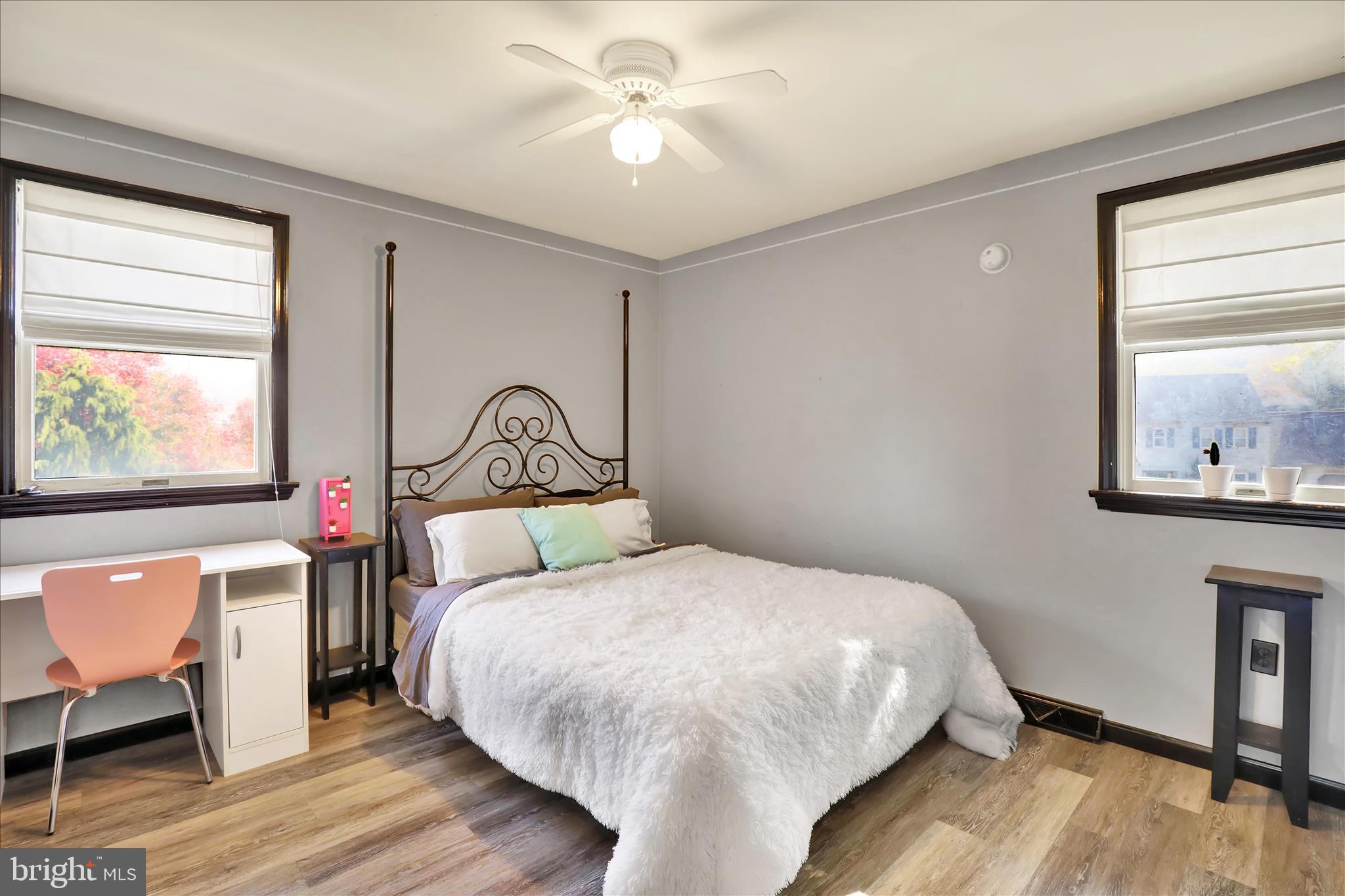 280 Snavely Mill Road Lititz, PA 17543 - Photo 28 of 45 a bedroom with a bed chandelier and a window