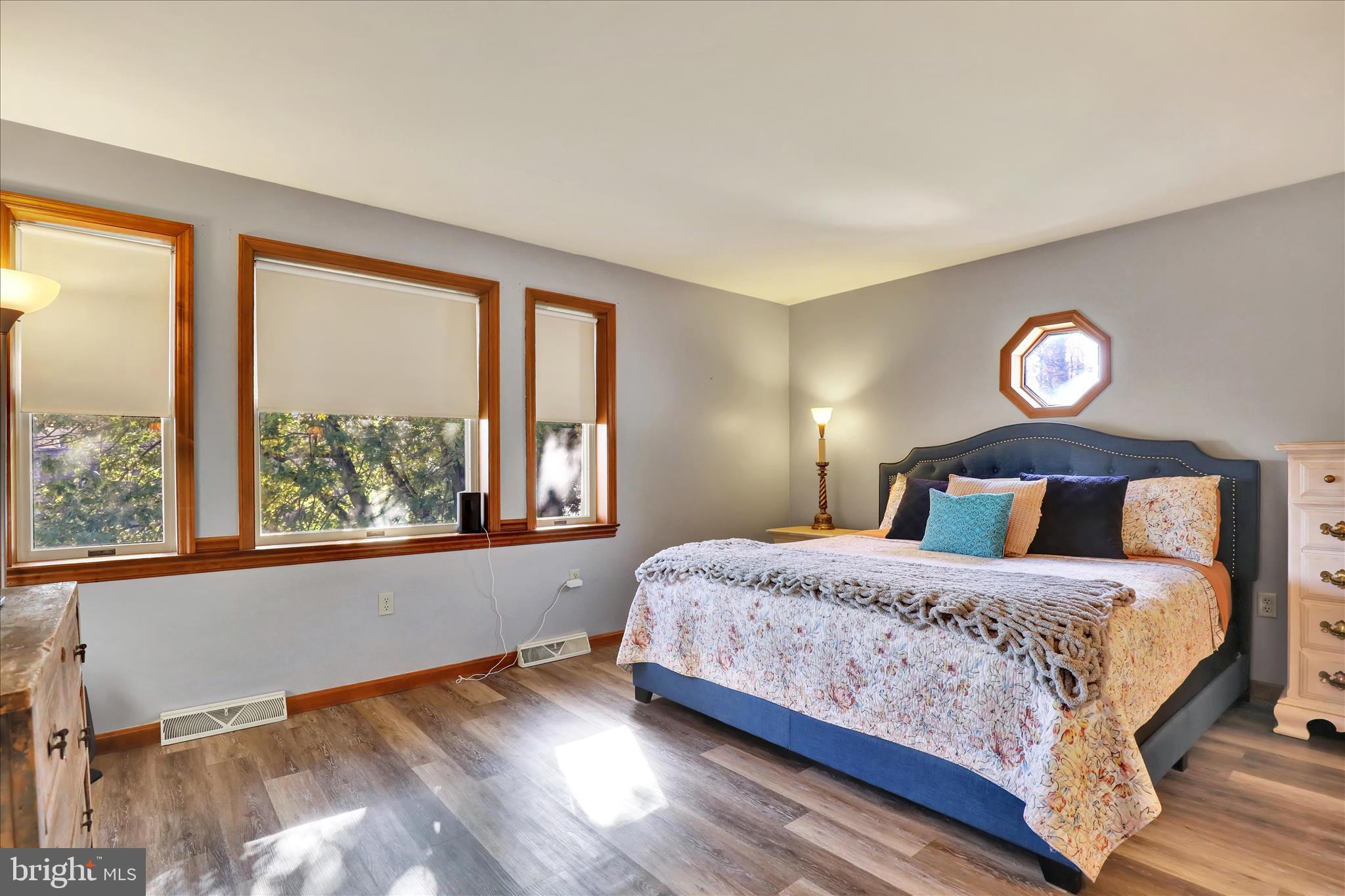 280 Snavely Mill Road Lititz, PA 17543 - Photo 30 of 45 a bedroom with a large bed and a large window