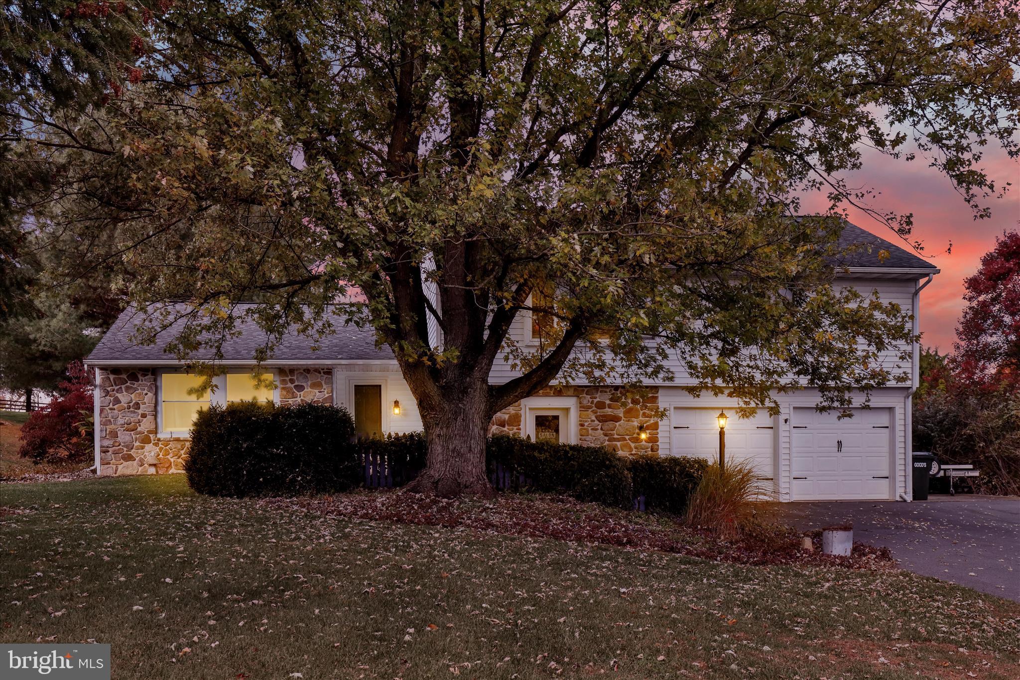 280 Snavely Mill Road Lititz, PA 17543 - Photo 7 of 45 a front view of a house with a garden