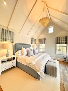 a view of an empty room with windows