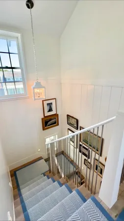 a bedroom with bed and window