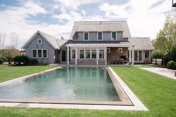 a view of a house with a swimming pool