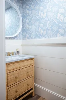 a living room with a table and a window