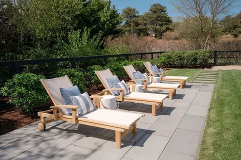 a view of swimming pool with lounge chair