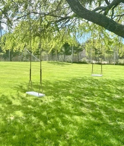 106 A Surfside Road, Unit EAST Nantucket, MA 02554 - Photo 42 of 42 a view of a yard with a tree