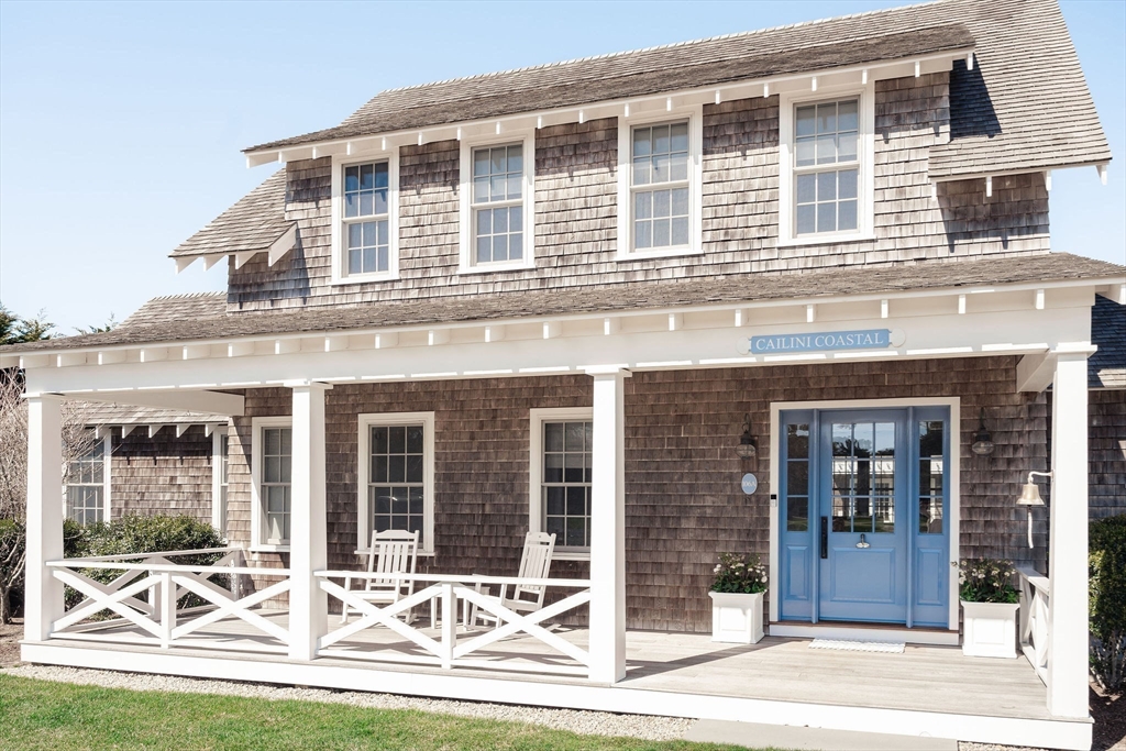 106 A Surfside Road, Unit EAST Nantucket, MA 02554 - Photo 7 of 42 front view of a brick building