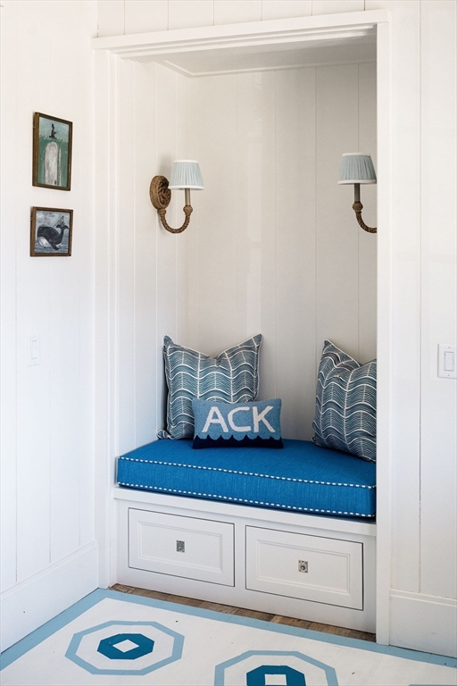 106 A Surfside Road, Unit EAST Nantucket, MA 02554 - Photo 10 of 42 a bathroom with a sink and a mirror